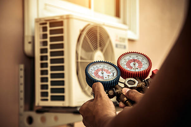 Professional Hvac Installation technician working in Wellesley Hills, MA